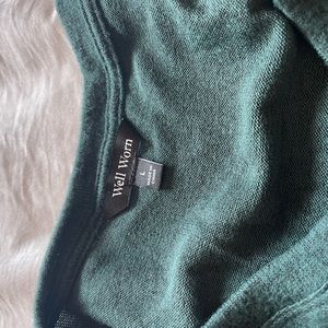Well worn green sweater